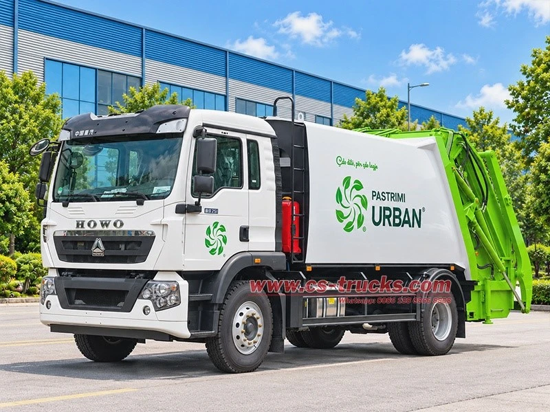 Front left view of SINOTRUK HOWO 251HP Euro 6 rear loader garbage truck Front left view of SINOTRUK HOWO 251HP Euro 6 rear loader garbage truck